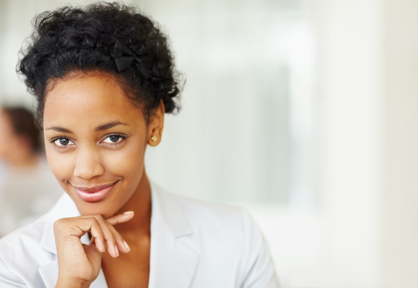 Portrait of a confident young business woman at work